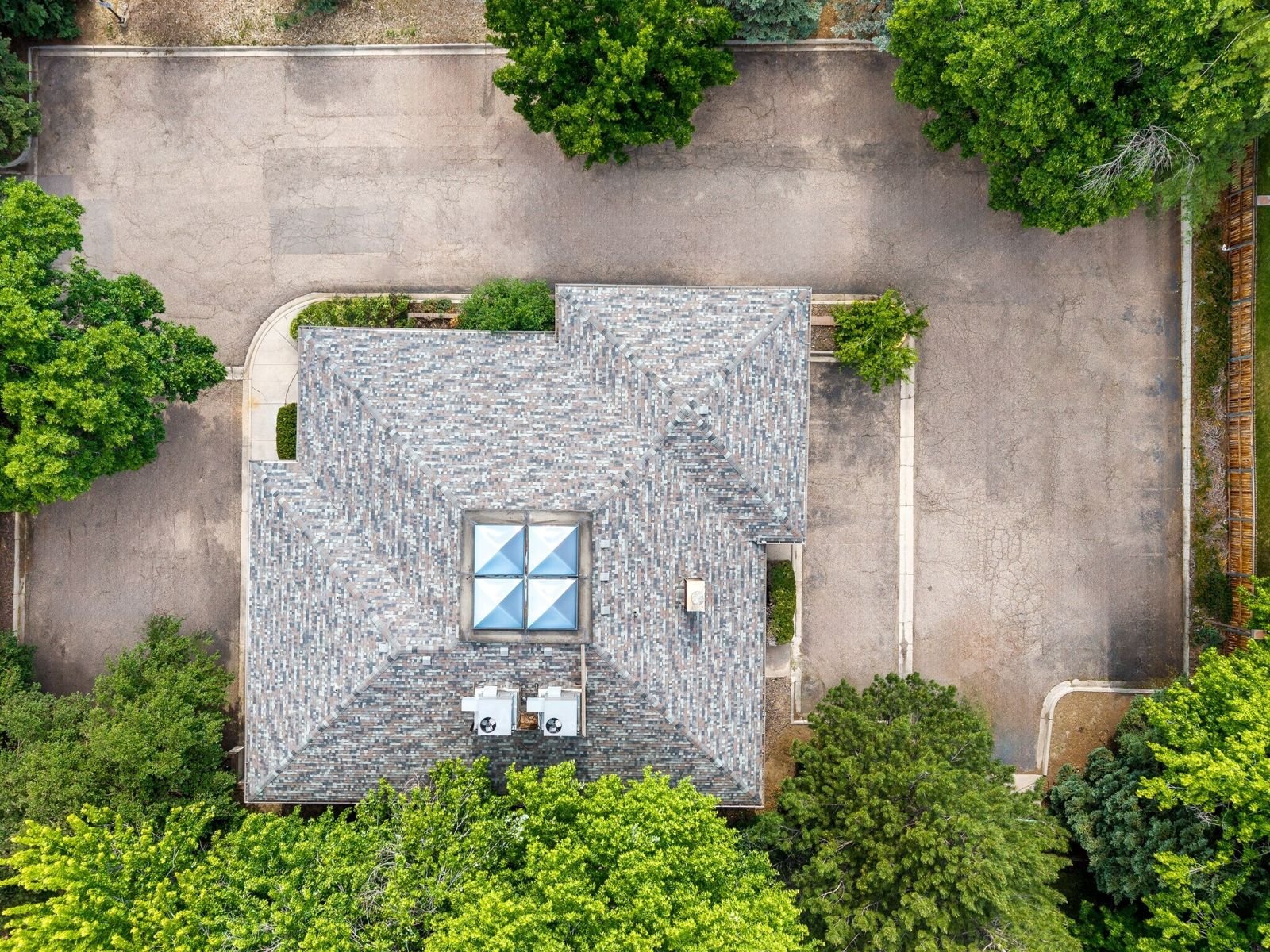 Aerial view of the medical office building and parking lot at 7515 W Yale Ave, Denver