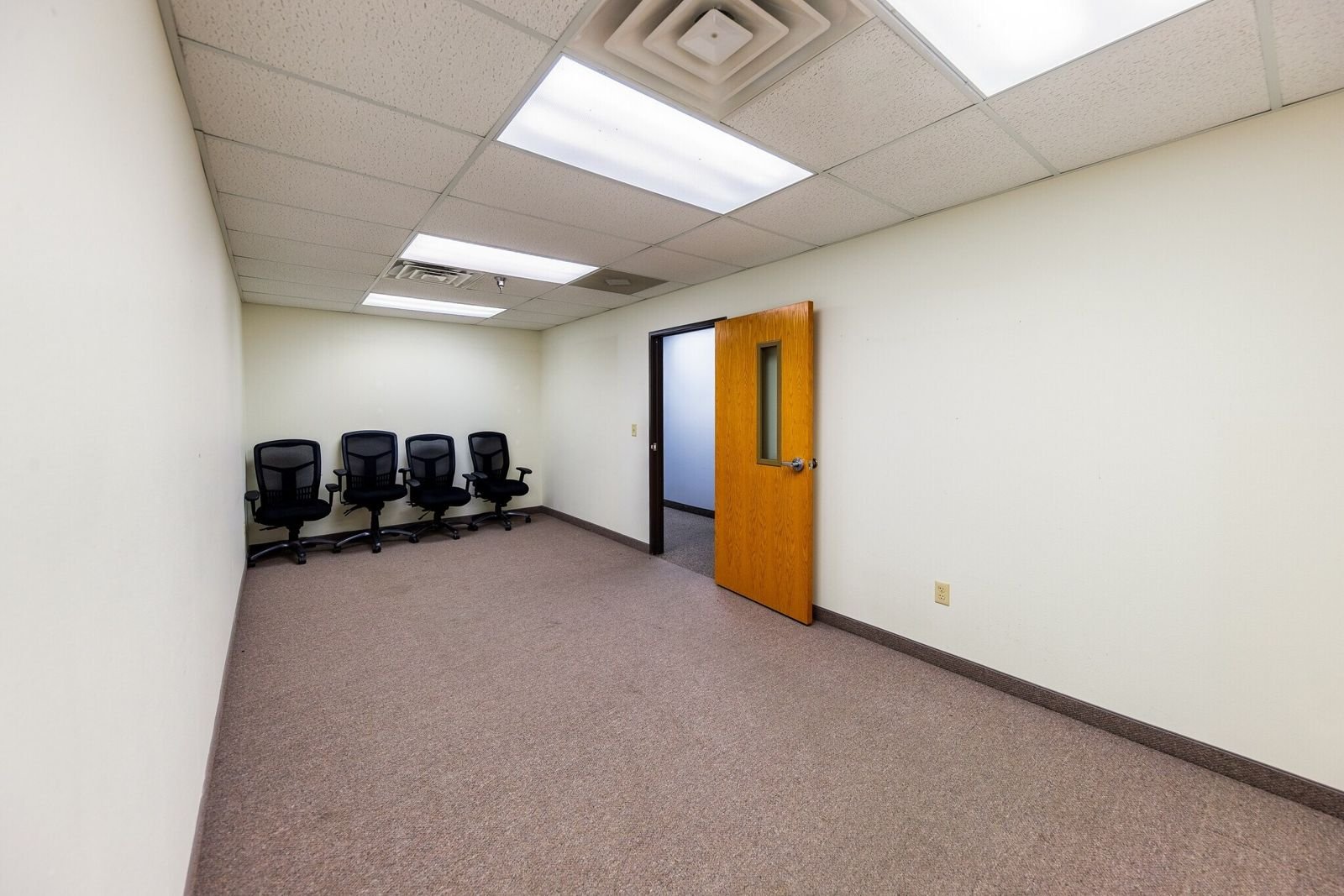 Open carpeted room in an office suite at Midland Shopping Center, Rapid City